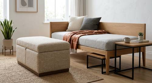 Multifunctional smart furniture including a storage ottoman and nesting tables in a modern living space.